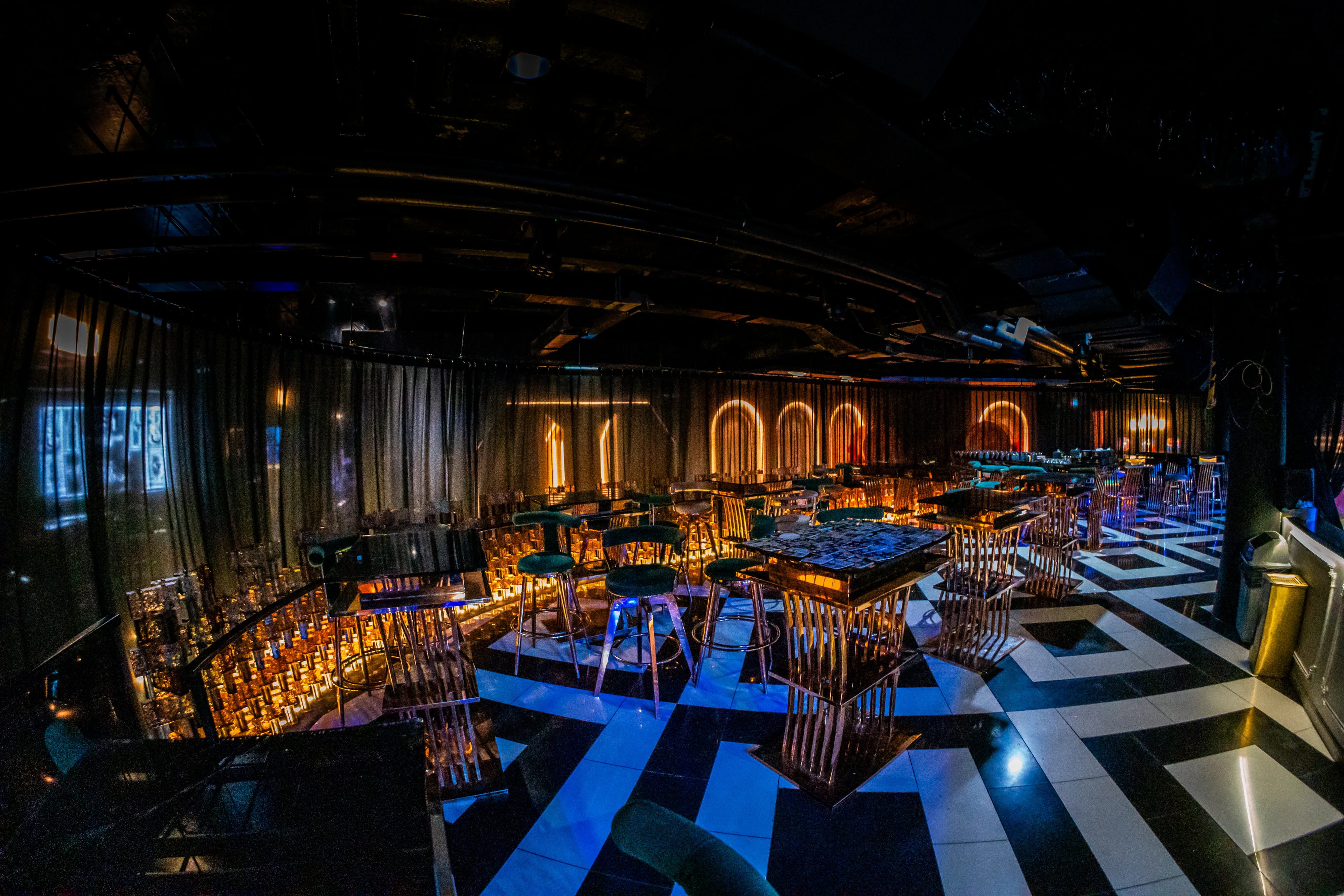 Gold architectural details and seating at Millennium Club