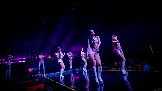 Dancers on the runway under blue spotlights at Millennium Club KL, Bukit Bintang